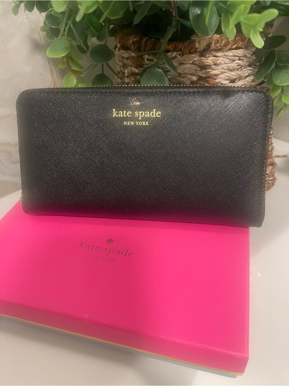 kate spade black zip-around Saffiano leather wallet with gold logo